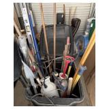 Two trash cans, handle tools, located locker 66