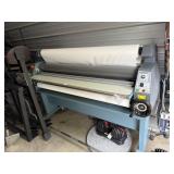 The machine in the image is a wide-format