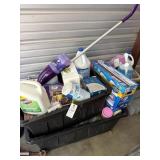 Two totes of cleaning supplies and one garbage