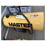 Master 60,000 BTU propane heater located locker