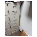 1     4 drawer file cabinet no key is unlocked