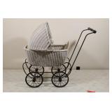 Vintage wicker doll stroller with hood