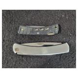 (2) BUCK KNIVES NO 522V & NO 425C