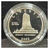 2003 FIRST FLIGHT PROOF CLAD HALF DOLLAR COIN -