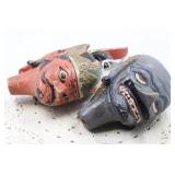 PAIR OF INDONESIAN WOOD PUPPET HEADS