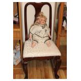 PORCELAIN DOLL AND SIDE CHAIR