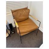 Metal frame chair and leather
