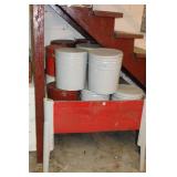 A DOZEN COVERED LARGE TINS