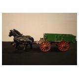 CAST IRON HORSE AND BUCK BOARD
