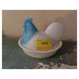 ROOSTER ON NEST