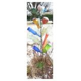 YARD ART: COLORFUL BOTTLES ON POLE