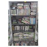 BLACK METAL SHELF WITH 500+ VIDEO GAMES
