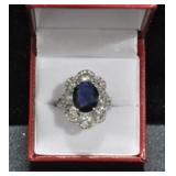 9.22 CT. SAPPHIRE AND WHITE TOPAZ ESTATE SYTLE RIN