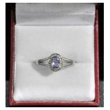 OVAL CUT TANZANITE AND DIAMOND DINNER RING