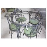 WROUGHT IRON PATIO TABLE AND 4 CHAIRS