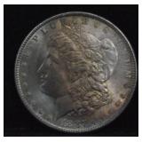 1887-P - MORGAN DOLLAR - UNC - RAINBOW - MS64