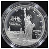 1986 ELLIS ISLAND SILVER DOLLAR