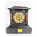 IRON CASED MANTLE CLOCK,