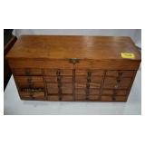 OAK LIFT TOP COUNTERTOP CHEST WITH 20 DRAWERS
