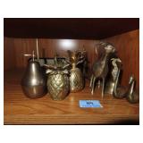 11 PCS. OF BRASS CANDLE STICKS, FIGURINES, ETC.