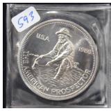 1986 "THE AMERICAN PROSPECTOR" 1 OZ. SILVER ROUND