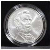 ABRAHAM LINCOLN COMMEMORATIVE SILVER DOLLAR UNC