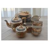 23 PC. LUSTERWARE TEA SET: TEA POT, SUGAR, CREAMER