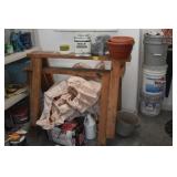 WOODEN SAW HORSES AND PLASTIC SHELF WITH PAINTS