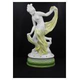 LADY WITH BACK LEG UP - YELLOW WITH GREEN BASE -