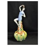 SWIMMER IN BLUE ATOP FLORAL PERCH - 9" MARKED: