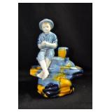 CERAMIC COPY OF MUSKOTA FISHING BOY - 7" - BLUES