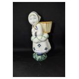 DANISH WOMAN WITH PACK ON HER BACK - 6 1/2"