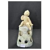 BABY SITTING ON ROCK - 4 1/2"