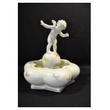 CUPID ON GLOBE WITH BUTTERFLY