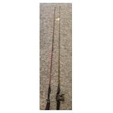 2 FISHING POLES AND 1 PFLUGER REEL