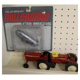 2 VINTAGE TOY TRACTORS AND NEW OLD NAVY BLIMP