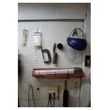 CONTENTS OF PEG BOARD: CLAMPS, KNIVES, PRY BAR,