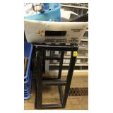 METAL RACK WITH TOOLS: WRENCHES AND SOCKETS