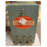 J.H. SCHULER CO. QUALITY REEDS VENDING MACHINE