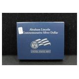 ABRAHAM LINCOLN SILVER DOLLAR W BOX PAPERS