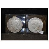 TWO PEACE DOLLARS