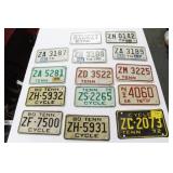 GROUPING: 14 MOTORCYCLE LICENSE PLATES MOST ARE