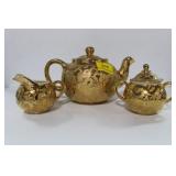 TEA POT, COVERED SUGAR BOWL AND CREAMER MARKED: