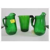 2 FOREST GREEN PITCHERS AND 1 OTHER GREEN GLASS