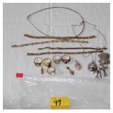 BAG OF ASSORTED SLIVER RINGS, NECKLACE AND