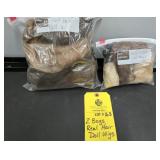 (2) BAGS OF REAL HAIR DOLL WIGS