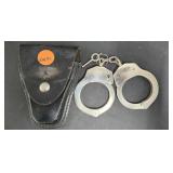 UNMARKED HANDCUFFS WITH KEY AND HOLSTER
