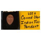 CARVED STONE FACE PENDANT