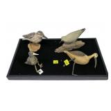 Lot, four small shore birds: one is a sandpiper by