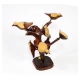 Lot, seven carved birds in a tree, 12" H.